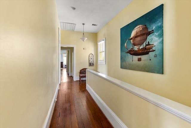 1427 Winnie St, Galveston, TX 77550 - corridor featuring dark wood finished floors and baseboards