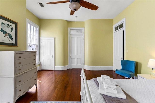 1427 Winnie St, Galveston, TX 77550 - bedroom with baseboards, wood-type flooring, and ceiling fan