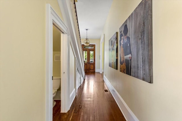 1427 Winnie St, Galveston, TX 77550 - hallway with wood-type flooring and baseboards