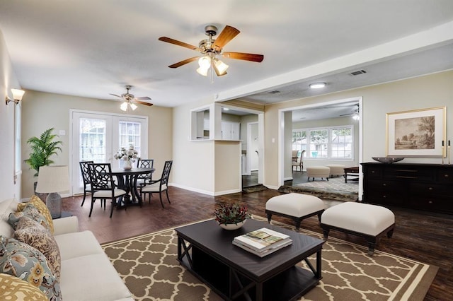 1009 Linden St, La Marque, TX 77568 - living area featuring wood finished floors, ceiling fan, and baseboards