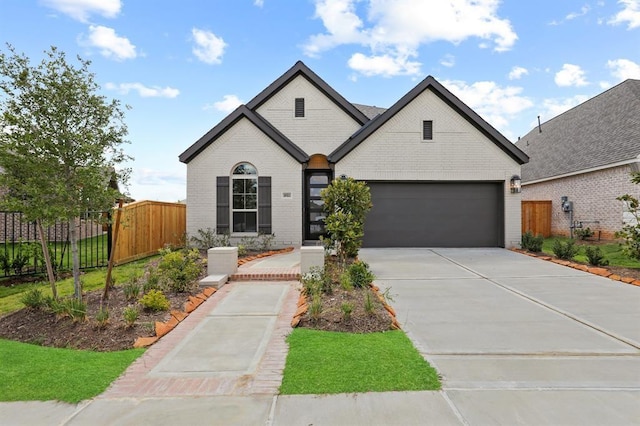 18511 Wolf Mountain Ln, Cypress, TX 77433 - view of front of property featuring brick siding, driveway, and a garage
