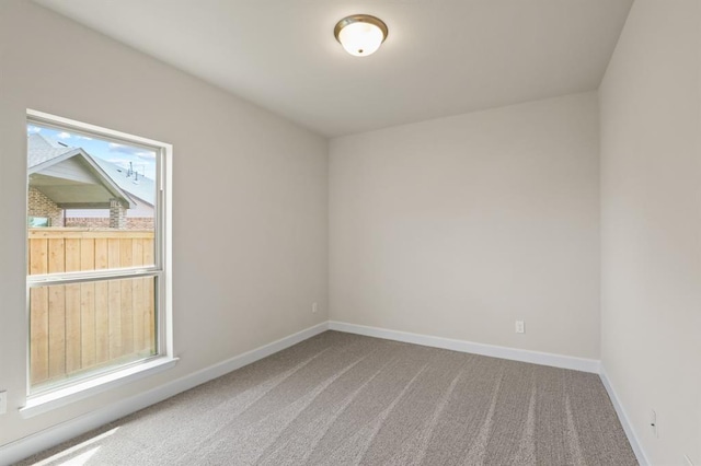 18511 Wolf Mountain Ln, Cypress, TX 77433 - carpeted empty room with healthy amount of natural light and baseboards