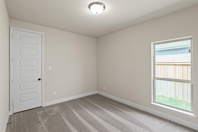 18511 Wolf Mountain Ln, Cypress, TX 77433 - unfurnished room with carpet floors and baseboards