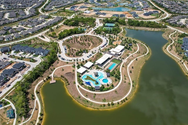 18511 Wolf Mountain Ln, Cypress, TX 77433 - aerial overview of property's location with a pool area, a large body of water, and nearby suburban area