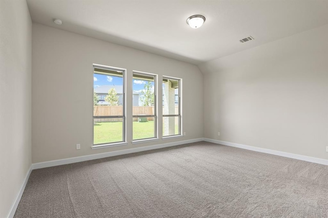 18511 Wolf Mountain Ln, Cypress, TX 77433 - carpeted empty room with baseboards, a smoke detector, and lofted ceiling