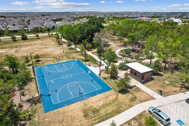 18511 Wolf Mountain Ln, Cypress, TX 77433 - view of sport court with community basketball court and a residential view