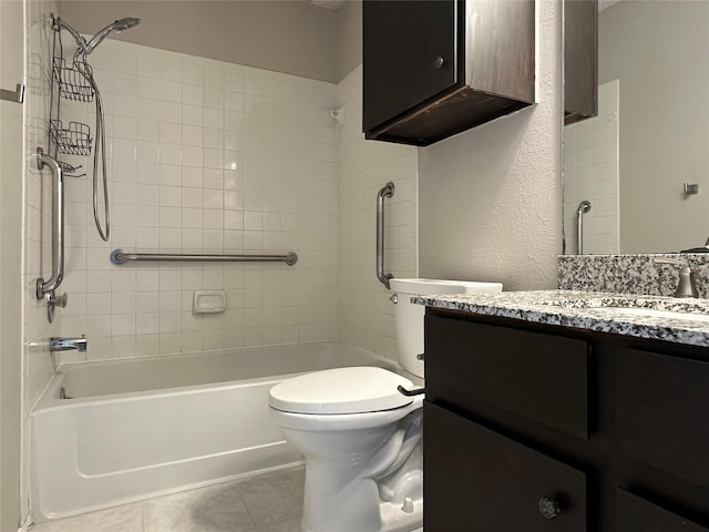 1405 Alma Dr, Austin, TX 78753 - full bath with tile patterned flooring, toilet, vanity, and shower / washtub combination