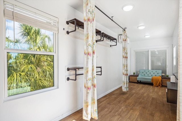 1350 23rd St, San Leon, TX 77539 - hall with wood finished floors and baseboards