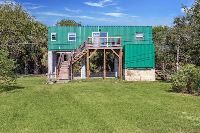 1350 23rd St, San Leon, TX 77539 - rear view of house with stairs, a yard, and a wooden deck