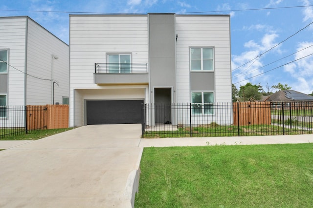 3309 Shelby Cir, Houston, TX 77051 - view of front of home featuring a balcony, a garage, and driveway