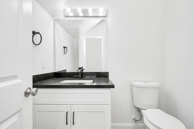 3309 Shelby Cir, Houston, TX 77051 - bathroom featuring vanity, toilet, and baseboards