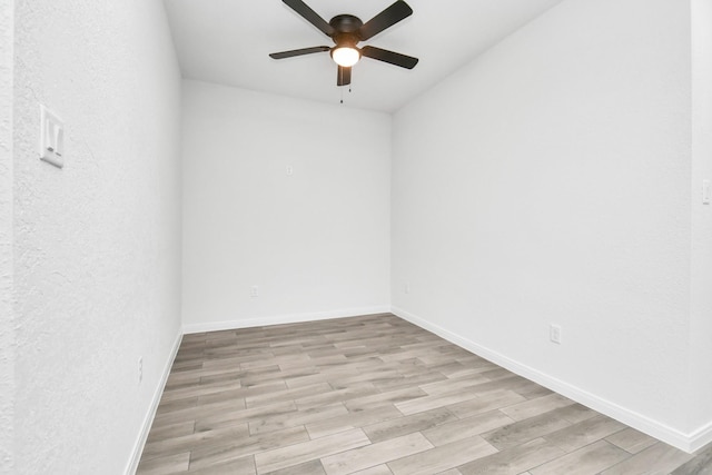 3309 Shelby Cir, Houston, TX 77051 - empty room with ceiling fan, light wood-type flooring, baseboards, and a textured wall