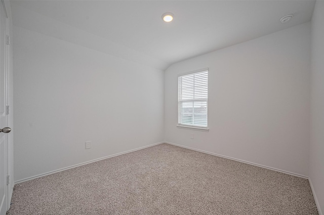 40434 Basalt Elm Rd, Magnolia, TX 77354 - carpeted spare room featuring a smoke detector, baseboards, recessed lighting, and vaulted ceiling