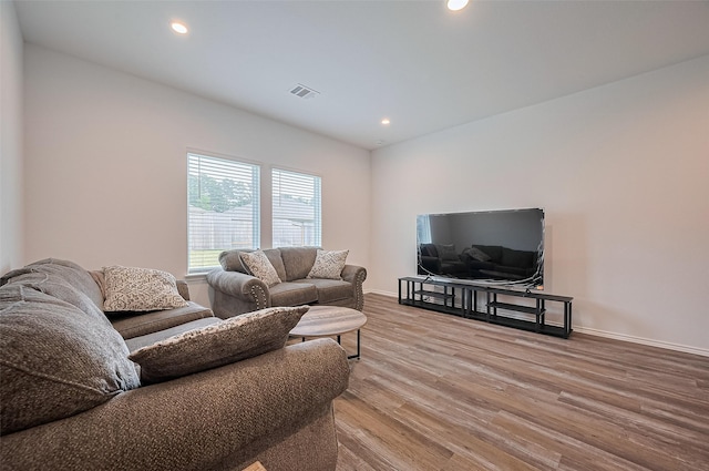 40434 Basalt Elm Rd, Magnolia, TX 77354 - living room featuring light wood-style flooring, recessed lighting, and baseboards