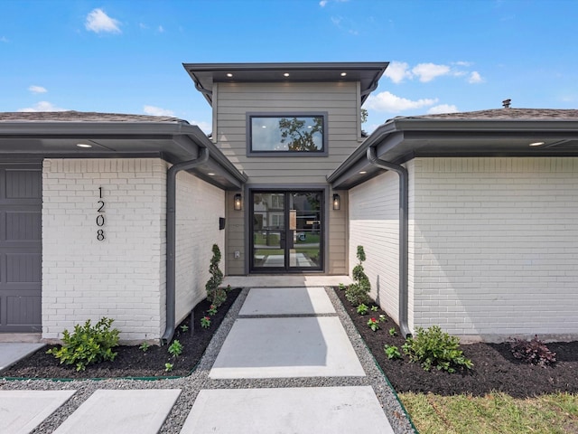 1208 Curtin St, Houston, TX 77018 - doorway to property featuring brick siding
