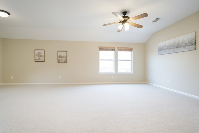 7902 Crystal Moon Dr, Houston, TX 77040 - empty room featuring lofted ceiling, carpet floors, baseboards, and a ceiling fan