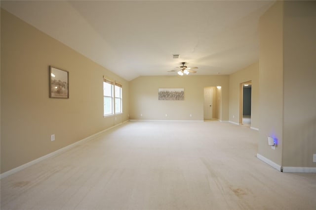 7902 Crystal Moon Dr, Houston, TX 77040 - empty room with a ceiling fan, baseboards, light carpet, and vaulted ceiling