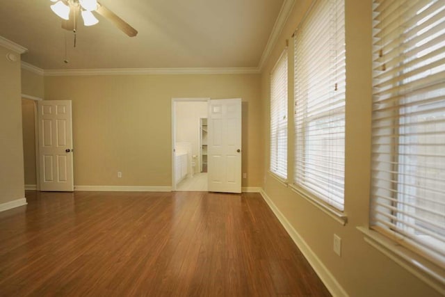 7902 Crystal Moon Dr, Houston, TX 77040 - unfurnished room featuring ornamental molding, a ceiling fan, wood finished floors, and baseboards
