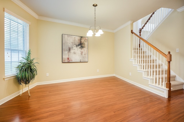 7902 Crystal Moon Dr, Houston, TX 77040 - empty room featuring light wood-style flooring, plenty of natural light, ornamental molding, and stairs