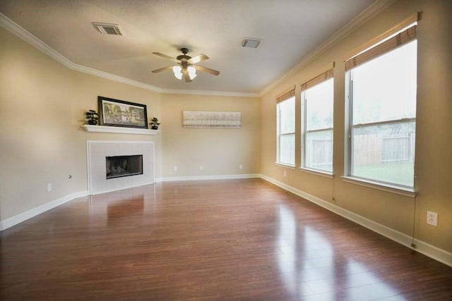 7902 Crystal Moon Dr, Houston, TX 77040 - unfurnished living room with wood finished floors, ceiling fan, crown molding, a fireplace, and baseboards