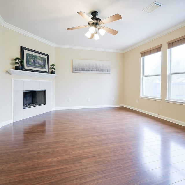 7902 Crystal Moon Dr, Houston, TX 77040 - unfurnished living room featuring wood finished floors, ornamental molding, a fireplace, and baseboards