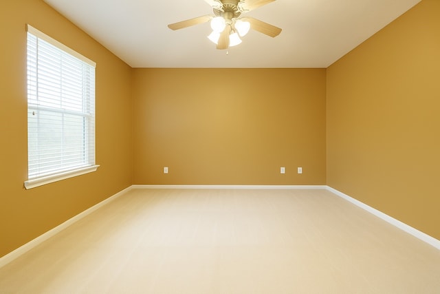 7902 Crystal Moon Dr, Houston, TX 77040 - empty room with light carpet, baseboards, and ceiling fan
