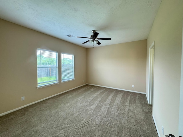 42 Blisten Spring Dr, Manvel, TX 77578 - carpeted empty room with baseboards, a ceiling fan, and a textured ceiling
