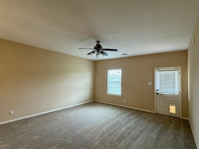 42 Blisten Spring Dr, Manvel, TX 77578 - carpeted empty room featuring a ceiling fan, baseboards, and a textured ceiling
