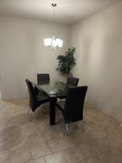 dining room with a chandelier