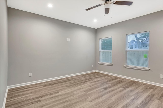 6818 Dumble St, Houston, TX 77021 - unfurnished room with light wood finished floors, baseboards, ceiling fan, and recessed lighting