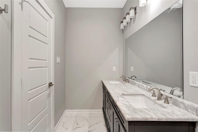 6814 Dumble St, Houston, TX 77021 - full bathroom featuring baseboards, marble look tiles, and double vanity