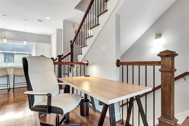 4504 Mount Vernon St Unit A, Houston, TX 77006 - dining area featuring wood finished floors, stairway, and recessed lighting