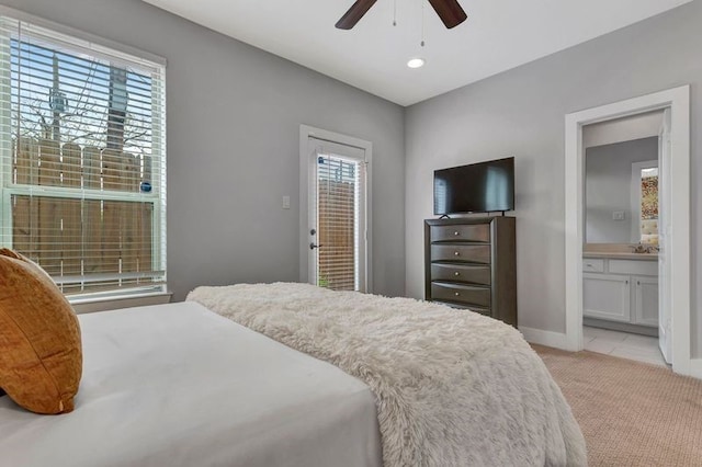 4504 Mount Vernon St Unit A, Houston, TX 77006 - bedroom with multiple windows, connected bathroom, baseboards, light carpet, and recessed lighting