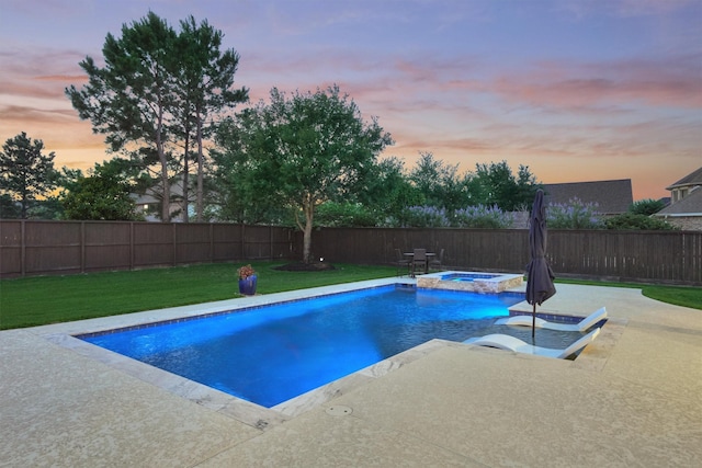 21514 Fairhaven Creek Dr, Cypress, TX 77433 - pool at dusk featuring a patio and a pool with connected hot tub