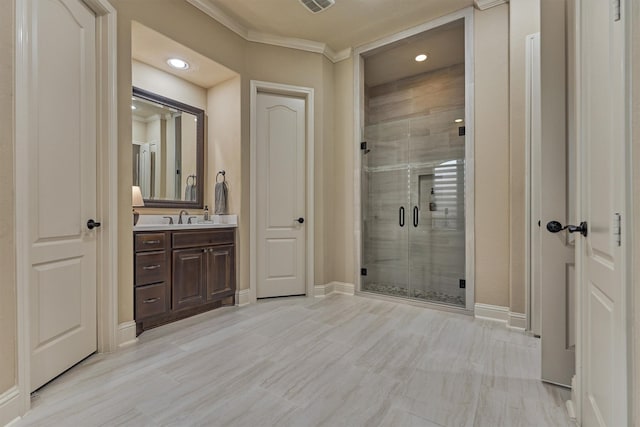 21514 Fairhaven Creek Dr, Cypress, TX 77433 - bathroom with vanity, ornamental molding, a shower stall, baseboards, and recessed lighting