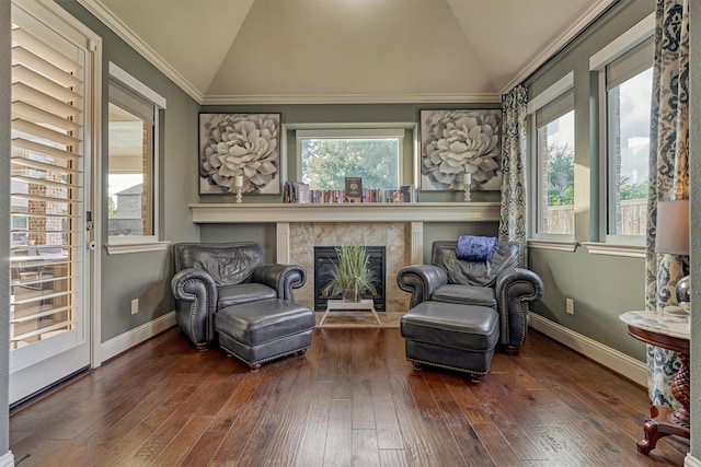 21514 Fairhaven Creek Dr, Cypress, TX 77433 - sitting room featuring vaulted ceiling, wood-type flooring, a high end fireplace, baseboards, and ornamental molding