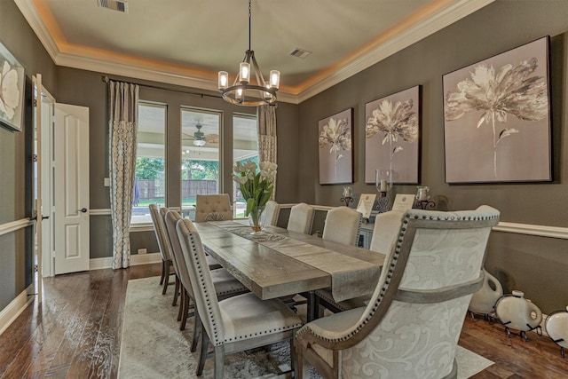 21514 Fairhaven Creek Dr, Cypress, TX 77433 - dining room with a chandelier, ornamental molding, wood finished floors, and baseboards
