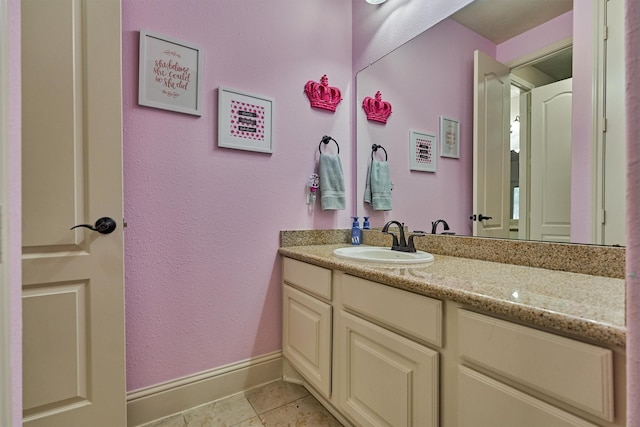 21514 Fairhaven Creek Dr, Cypress, TX 77433 - bathroom featuring vanity, baseboards, and tile patterned flooring