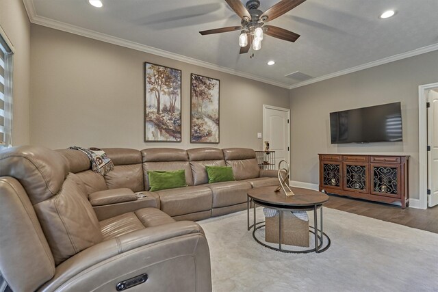 21514 Fairhaven Creek Dr, Cypress, TX 77433 - living room with a ceiling fan, wood finished floors, recessed lighting, baseboards, and ornamental molding