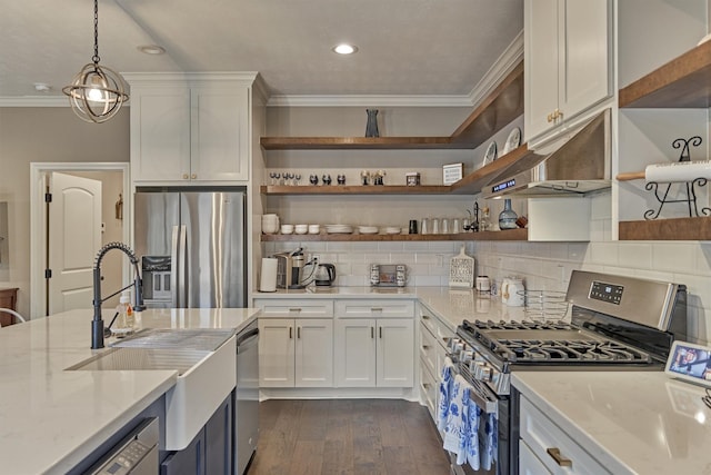 21514 Fairhaven Creek Dr, Cypress, TX 77433 - kitchen with open shelves, appliances with stainless steel finishes, crown molding, dark wood-style flooring, and a sink