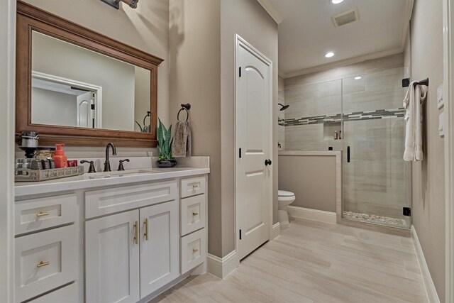 21514 Fairhaven Creek Dr, Cypress, TX 77433 - full bathroom with a shower stall, toilet, vanity, recessed lighting, and baseboards