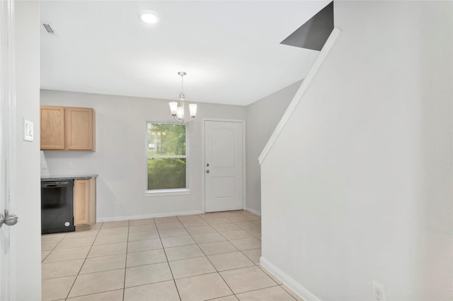 4079 Frontier Rd, Willis, TX 77378 - entrance foyer with baseboards, a chandelier, and light tile patterned flooring