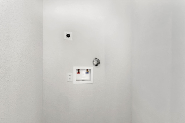 4079 Frontier Rd, Willis, TX 77378 - laundry area featuring hookup for an electric dryer and washer hookup