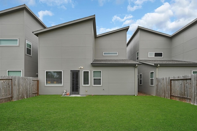 6827 Rocinante Ln, Houston, TX 77092 - back of house featuring stucco siding
