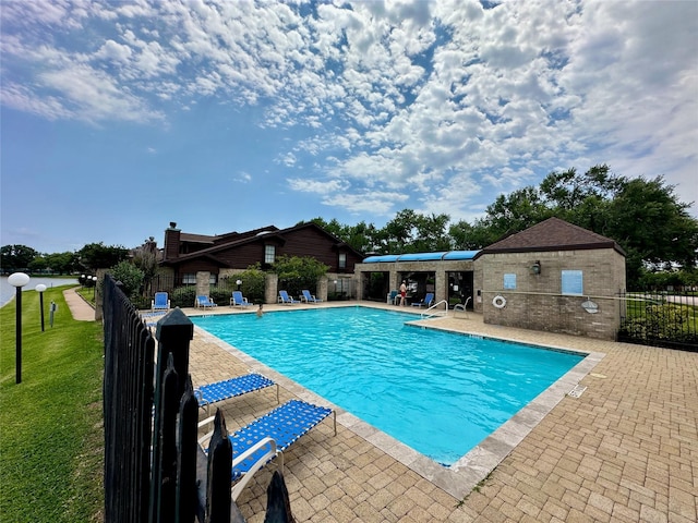 2611 Grants Lake Blvd Unit 237, Sugar Land, TX 77479 - community pool featuring a patio
