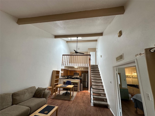 2611 Grants Lake Blvd Unit 237, Sugar Land, TX 77479 - living area featuring dark wood-style floors, a ceiling fan, and stairs