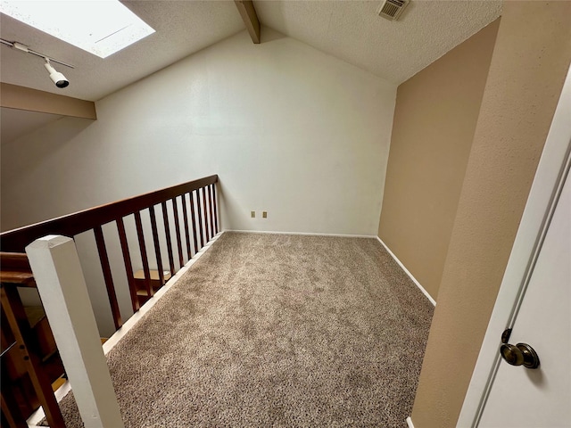 2611 Grants Lake Blvd Unit 237, Sugar Land, TX 77479 - additional living space with a textured ceiling and carpet flooring