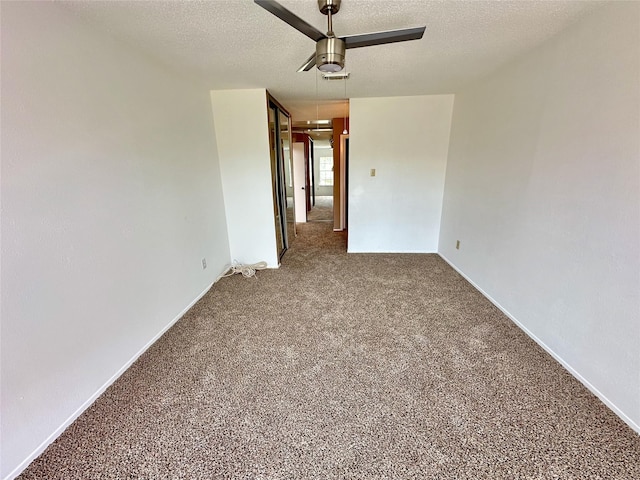 2611 Grants Lake Blvd Unit 237, Sugar Land, TX 77479 - carpeted spare room featuring a ceiling fan and a textured ceiling