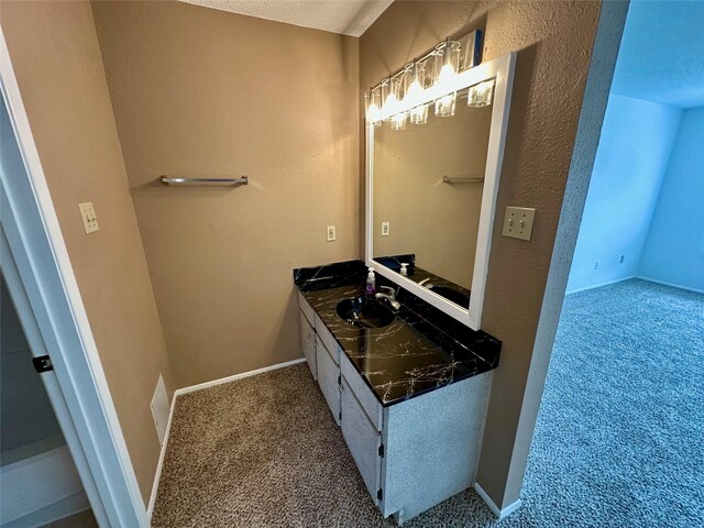 2611 Grants Lake Blvd Unit 237, Sugar Land, TX 77479 - bathroom with vanity and baseboards