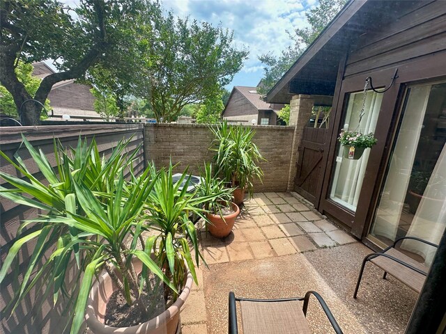 2611 Grants Lake Blvd Unit 237, Sugar Land, TX 77479 - view of patio with fence and a gate